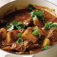 Lamb Vindaloo · The name “Vindaloo” is derived from the Portuguese dish “ Carne de vinha d'alhos,” which is ...