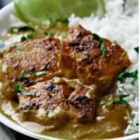Salmon Tikka Masala · Salmon cubes marinated overnight in ginger, garlic, select spices & yogurt, cooked in a tand...