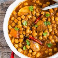 Chana Lahori · Chickpeas, tomato, onion and chana masala. Includes serving of rice. Vegetarian.