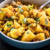 Aloo Gobi  · Combination of cauliflower and potato in an onion-tomato based curry-spiced the Indian way. ...