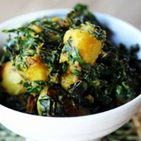 Saag Aloo · Spinach, potatoes, garlic, onion and green chili. Includes serving of rice. Vegetarian.