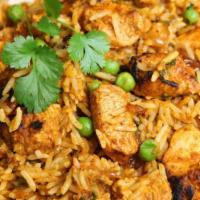 Chicken Biryani · Cooked with exotic spices, saffron, fresh coriander and mixed with basmati rice. Served with...