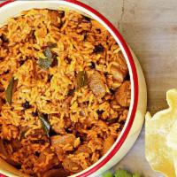 Lamb Biryani · Cooked with exotic spices, saffron, fresh coriander and mixed with basmati rice. Served with...