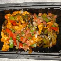 Chicken Breast Fajitas · Marinated chicken breast with fresh garlic, Mexican spices, and broiled served over of assor...