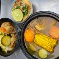 Caldo De Res · Beef soup with vegetables. Served with a side of rice.