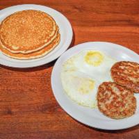 Country Combo · Two pancakes or French toast served with two eggs your way and choice of bacon, ham or sausa...