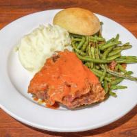Bacon’s Own Meatloaf  Plate · Made using a blend of ground beef and pork. Drizzled with homemade tomato sauce and served w...