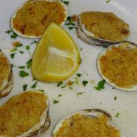 Clams Oreganato · Littleneck clams baked with seasoned breadcrumbs.