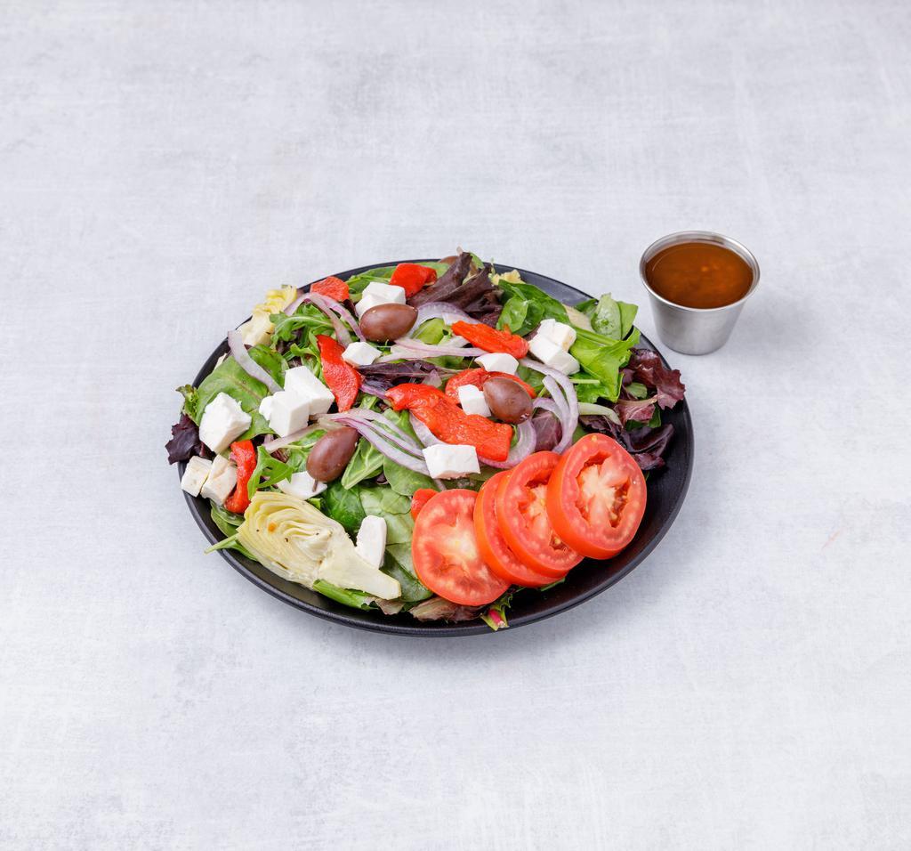 Baby greens  Salad · Artichoke hearts, roasted peppers, tomatoes, Gaeta olives, red onions and homemade mozzarella.
