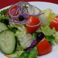 Tossed Salad · Mixed lettuce, tomatoes, olives, cucumbers, shredded carrots and red onions.