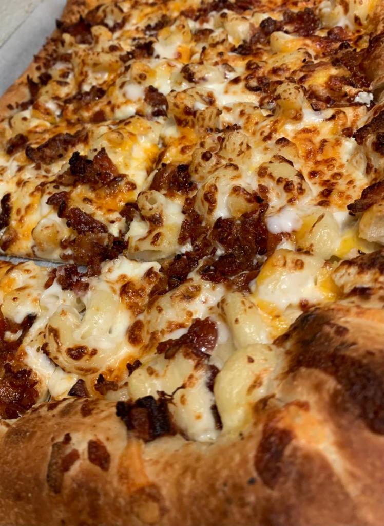 Mac & Cheese Pizza · Mac & Cheese, Mozzarella, and Cheddar on our Cream Cheese Base. Add Crispy Bacon, Buffalo Chicken or Grilled Chicken. 