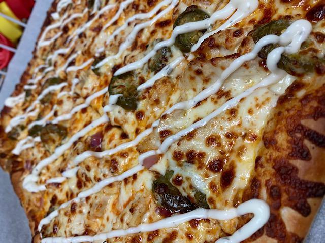 Kickin Chicken · Grilled chicken, jalapeno and onion on our buffalo sauce, side of Ranch.