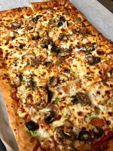 Veg-N-Out · Green peppers, onion, mushrooms, black olives and tomato on marinara.