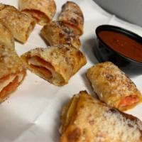 Ziggy Bites · Our homemade pizza dough stuffed with cheese and pepperoni, served with warm marinara sauce.