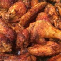 Six (6) Twice Baked  Wings · Twice baked wings tossed in your choice of Buffalo, BBQ or Ziggy's Blend (Buffalo, BBQ and T...