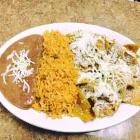 Chilaquiles Rojo o Verdes · Corn Tortilla chips simmered, red or green sauce comes W/Rice&Beans.