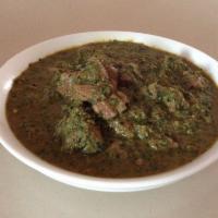 Lamb Saag · Boneless lamb pieces cooked in spices and puree of spinach leaves.