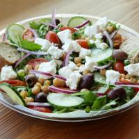 Mediterranean Salad · Arugula, chickpeas, cucumber, grape tomatoes, red onions, feta cheese Kalamata olives and da...