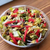 Mexicali Salad · Arugula,  romaine, grape tomatoes, charred con, corn chips, red onions and black beans Parme...