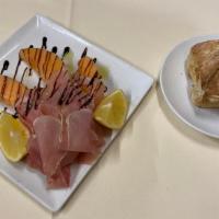 Prosciutto e Melone · Parma Italian ham with melon. Fresh hot home-made bread.