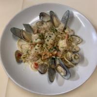 Pasta di Mare · Calamari, shrimp,scallops, mussels and clams.