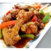 S7. Chicken Dynamite · 10 pieces. Deep fried chicken wings stir-fried with garlic and Sriracha hot sauce. Spicy.