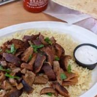 Gyros Plate · Precombined beef and lamb slowly flame broiled with Eastern spices, onion and itzatziki sauc...