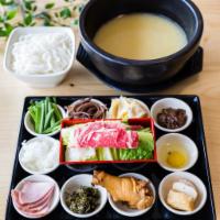 R1. Original Crossing Bridge Rice Noodles 原味过桥米线 · Original chicken soup base served with noodles and many small side dishes.