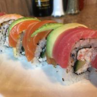 Rainbow Roll · Nori (dried seaweed), sushi rice, sesame seed, crabmeat salad, cucumber, and avocado.  This ...