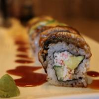 Dragon Roll · Nori (dried seaweed), sushi rice, sesame seed, crabmeat salad, cucumber, and avocado.  This ...