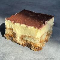 Tiramisu · Made with base of sponge cake, moistened in coffee, cream based on eggs, with cocoa powder o...