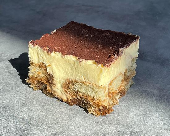 Tiramisu · Made with base of sponge cake, moistened in coffee, cream based on eggs, with cocoa powder on the top.