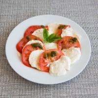 Caprese Salad · Fresh buffalo mozzarella, tomato, basil, extra virgin olive oil, and balsamic reduction dres...
