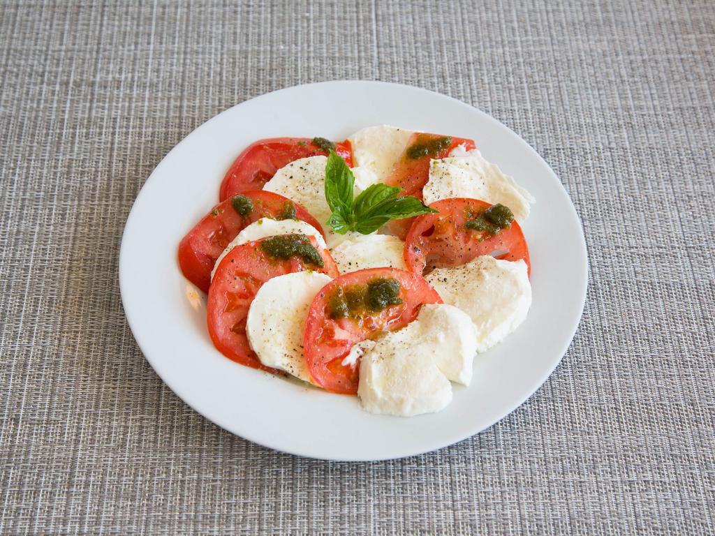 Caprese Salad · Fresh buffalo mozzarella, tomato, basil, extra virgin olive oil, and balsamic reduction dressing.