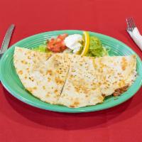 Quesadilla · Served with sour cream and guacamole. Add protein for an additional charge.