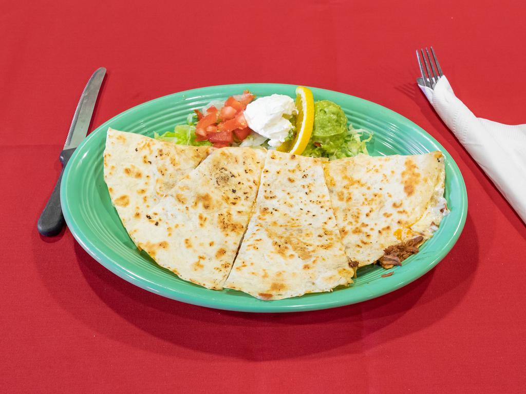 Quesadilla · Served with sour cream and guacamole. Add protein for an additional charge.