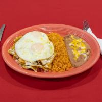 Chilaquiles with Egg · Fried corn tortillas simmered in homemade pork Chile verde red sauce or traditional green sa...