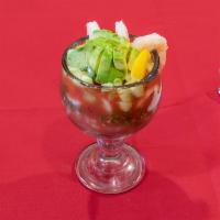 Shrimp Cocktail · Coctel de camaron. Served with onions, cilantro, tomatoes, cucumbers, avocado and our specia...