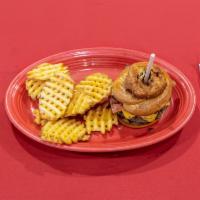 Cowboy Angus Burger · Crispy crumbled applewood smoked bacon, cheddar cheese, onion rings and smokey BBQ sauce.