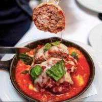 Wagyu Meatball · Wagyu beef, veal, and pork Meatball, with San Marzano tomato sauce, basil, and three cheese ...
