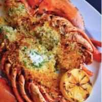 Signature Stuffed Lobster · Crab meat stuffing.