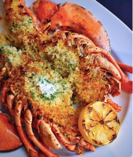 Signature Stuffed Lobster · Crab meat stuffing.