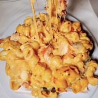 Macaroni and Cheese with Lobster  · Lobster & lobster sauce.
