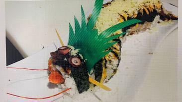 Super Dragon  Roll · Shrimp tempura, spicy tuna, top 1/2 eel, with eel sauce, and 3 kinds of fish eggs.