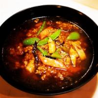14. Nikumiso Ramen · Spicy ground pork on shoyu ramen.