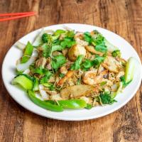 64. Sauted Combination with Chow Mein · Mi xao thap cam. served with shrimp, chicken, pork, calamari, fish cake, fish ball, and vege...