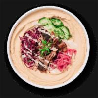 Lil' Lamb · Lamb shawarma with dill cucumbers, cabbage slaw, pickled onions, and classic tahini on our c...