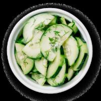 Dill Cucumbers · Fresh cucumbers mixed with dill and red wine vinegar