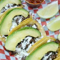 Nortenos Tacos · Fresh white cheese and avocado.