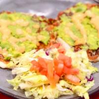La Santa · 2 tortillas with melted cheese and guacamole and your choice of meat.